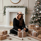 Joyful gift wrapping scene on floor