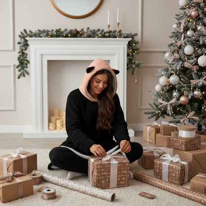 Joyful gift wrapping scene on floor