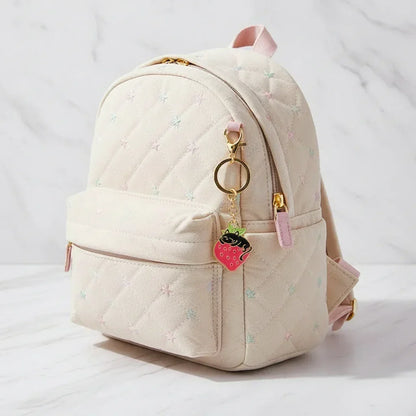 Keychain dangling from bag