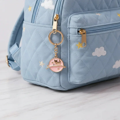 Keychain dangling from bag