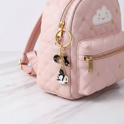 Keychain dangling from bag