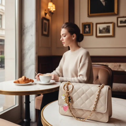 Keychain detail at café table