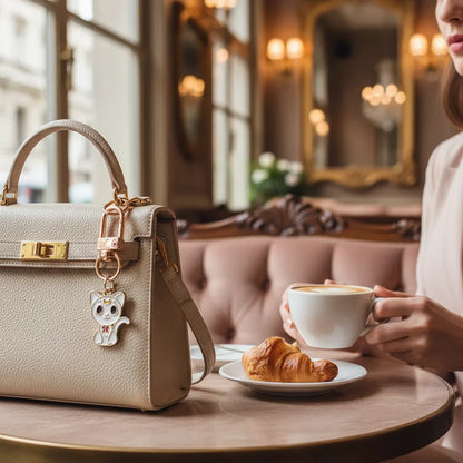 Keychain detail at café table