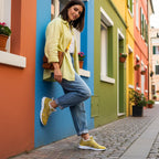 Leaning against vibrant European wall