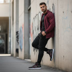 Leaning against wall in athletic wear