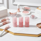 Lipstick among makeup on dressing table