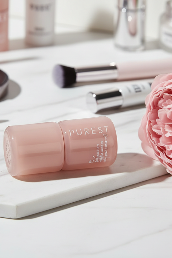 Lipstick with peony on marble
