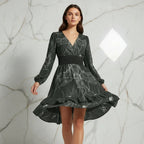 Woman modeling black printed ruffle hem dress with V-neck and long sleeves from Ivorynn fashion