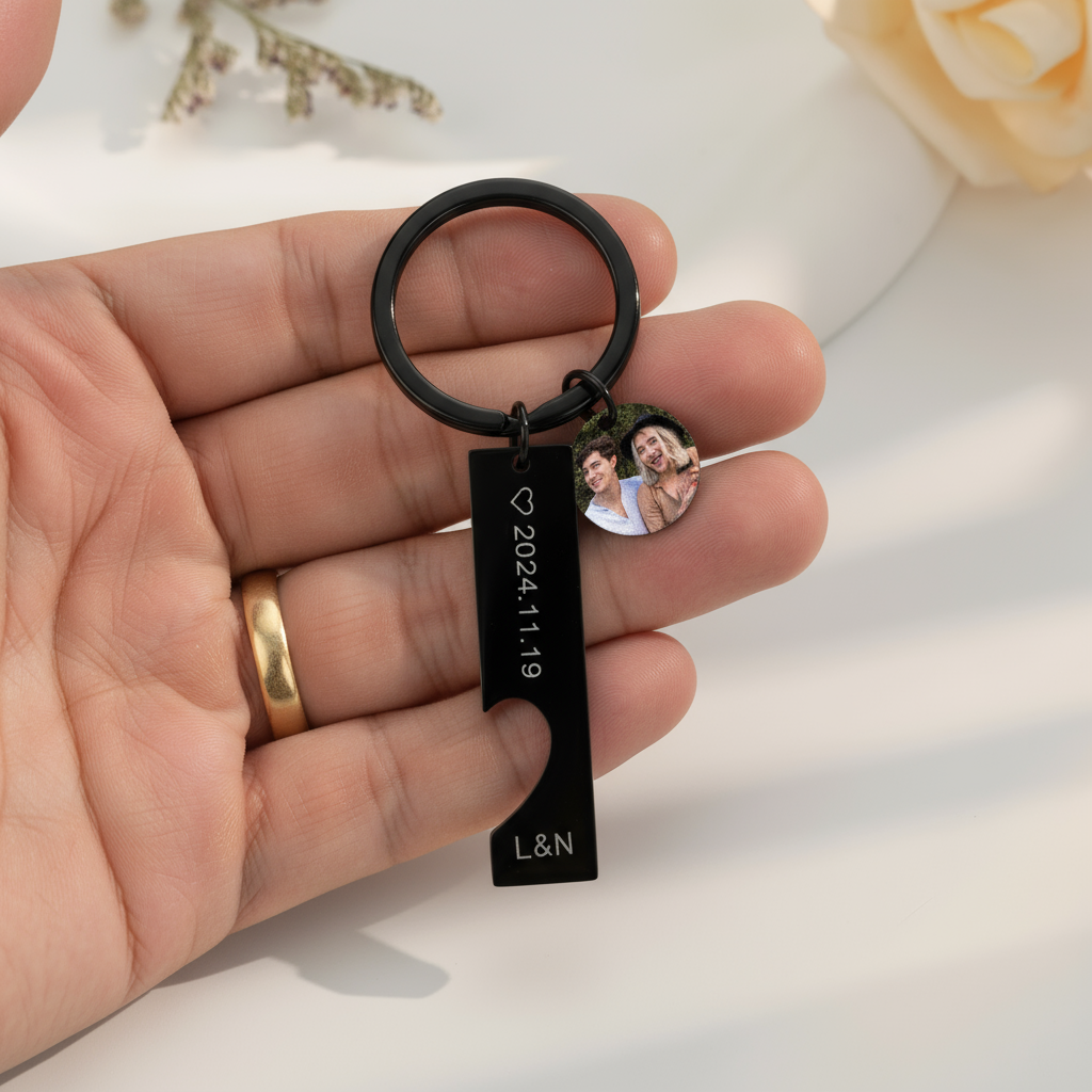 Man holding black keychain