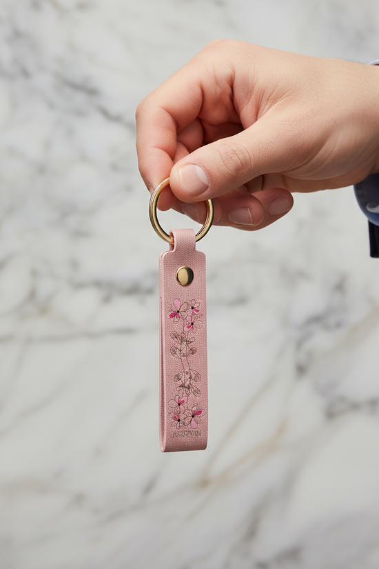 Man holding keychain - side angle