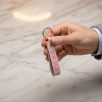 Man holding keychain - three-quarter view