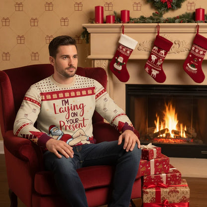 Man in Christmas sweater - Armchair by fireplace