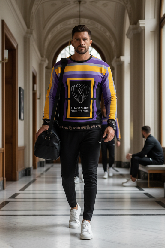 Man in sweatshirt walking through sports club hallway