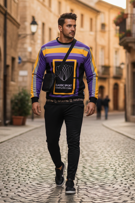 Man wearing sweatshirt walking through European street