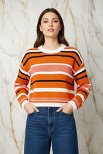 Mid-shot - styled with high-waisted bottoms