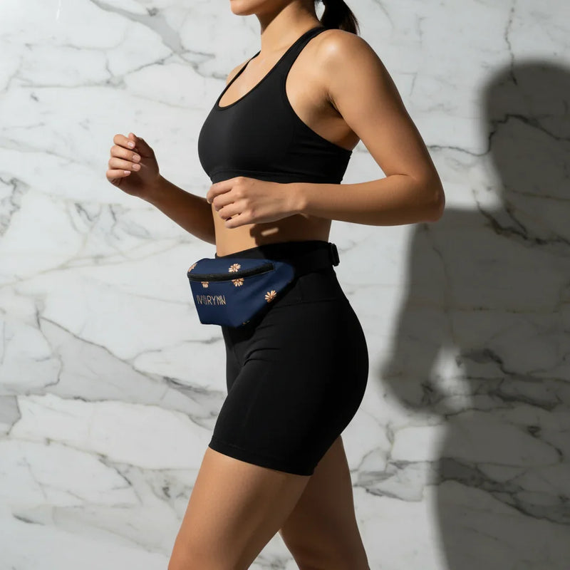 Opposite side angle with black shorts on marble