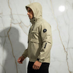 Opposite side profile - athletic man in khaki jacket