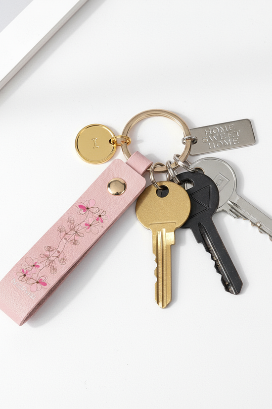 Overhead flat lay with keys and accessories