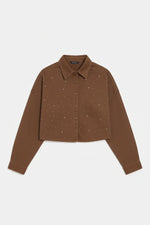 Overhead view of milk chocolate denim shirt