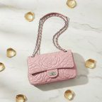 Pink bag - flat lay with golden petals