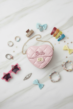 Pink bag - flat lay with kids accessories