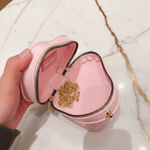 Pink bag - opened by hand marble background