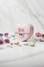 Pink bag - side angle with accessories 2