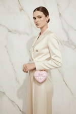 Pink bag - side pose cream coat