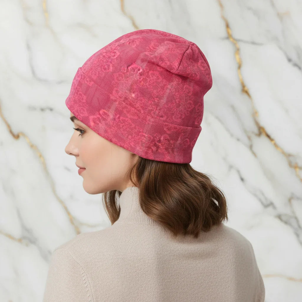 Woman wearing pink floral knitted hat, back view, Ivorynn fashion apparel