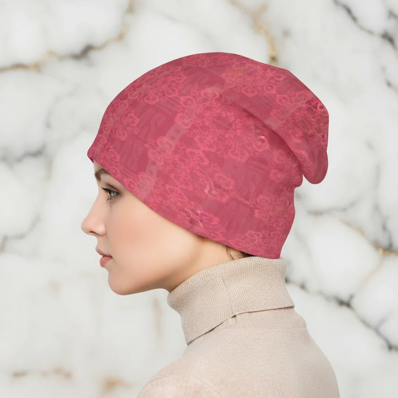 Woman in side profile wearing pink floral knit hat, stylish winter fashion from Ivorynn