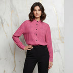 Woman in pink floral shirt and black pants posing, stylish fashion by IVORYNN