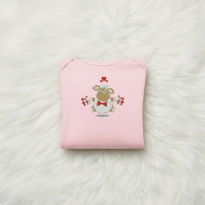 Pink onesie folded neatly showing design