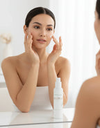 Professional beauty photo - woman applying moisturiser