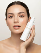 Professional beauty portrait - woman holding product