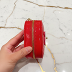 Red bag - hand holding side