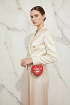 Red bag - side pose double breasted blazer