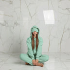 Relaxed lifestyle pose leaning against surface