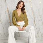 Seated elegant pose on white chair