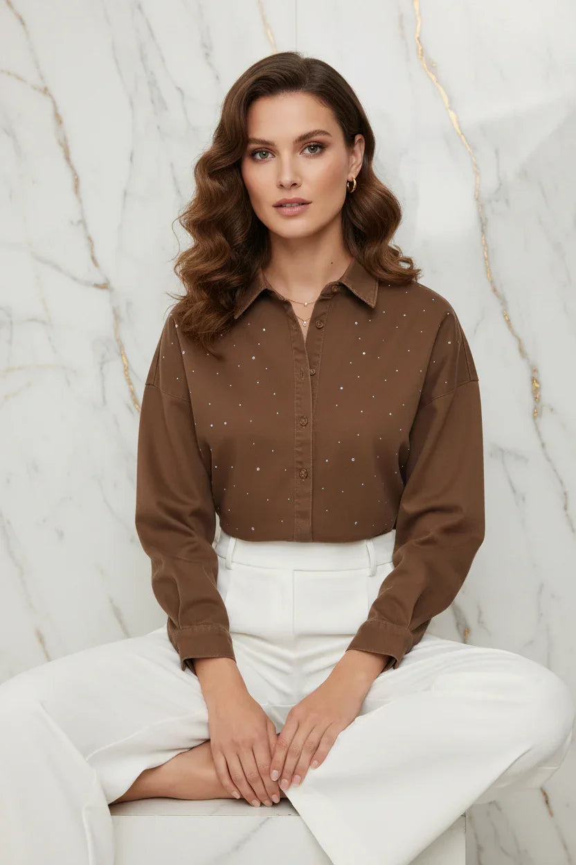 Seated pose with crossed legs on marble background