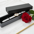 Side angle view with watch and rose