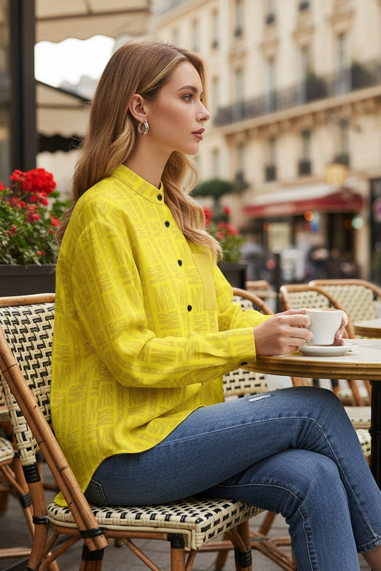 Side profile of yellow shirt at café
