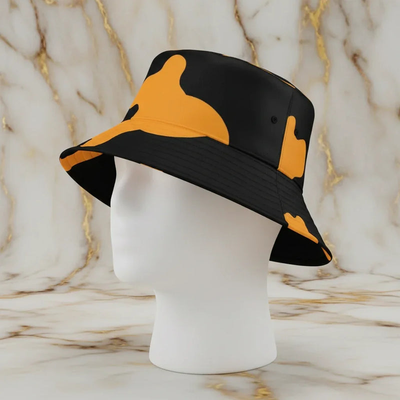 Black and yellow camo bucket hat on mannequin, stylish apparel at Ivorynn