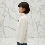 Side profile on marble backdrop