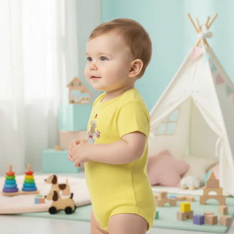 Side view of baby in yellow onesie