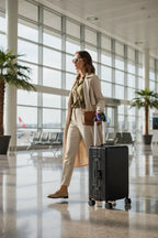 Side view - Woman walking, luggage closed