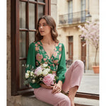 Sitting on café windowsill with flowers