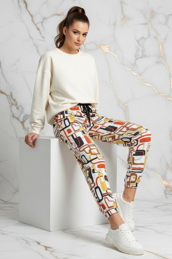 Sitting on cube with leg extended