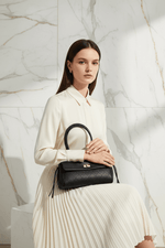 Sitting with Bag