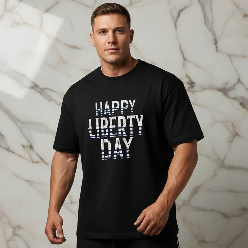 Sporty man in black 'Happy Liberty Day' t-shirt, marble background, Ivorynn men's fashion