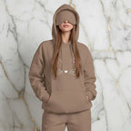 Standing with hands in pocket